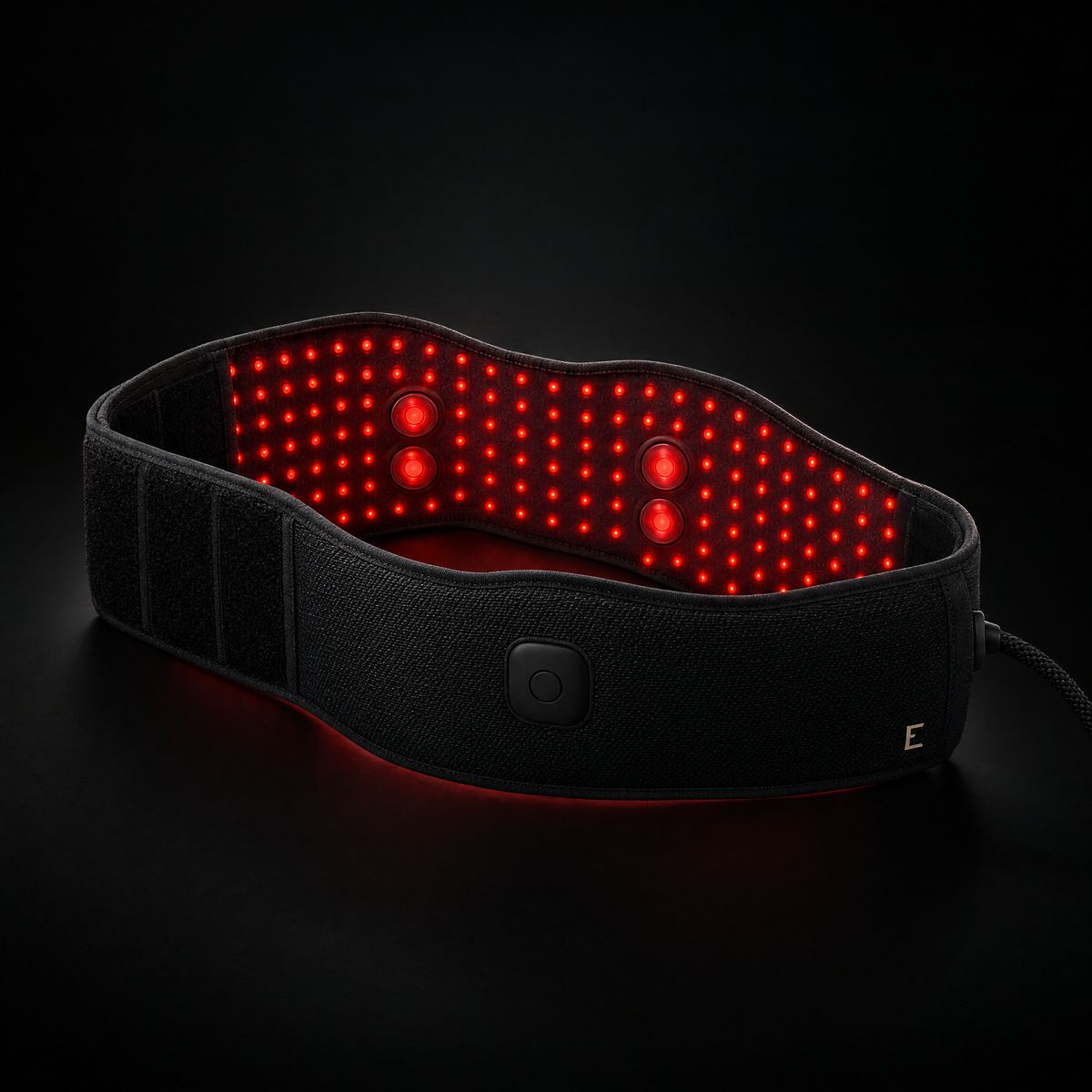 Elvaren Neural Wrap — wide recovery wrap belt with the red LED contact face lit